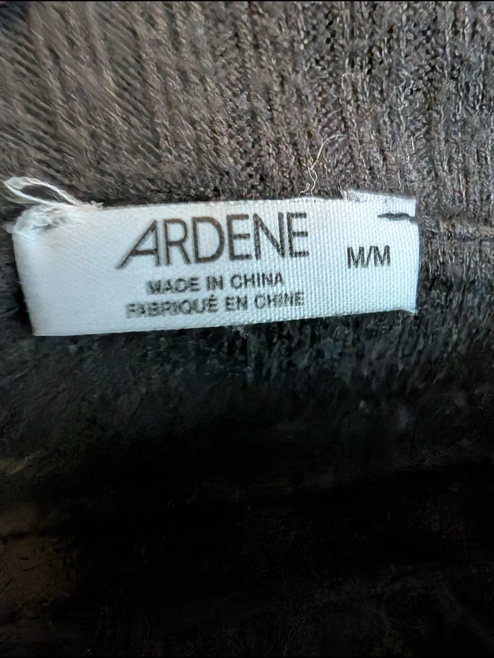 Ardene Black Off-the-Shoulder Ribbed Sweater Flared Scallop Sleeves - Picture 7 of 10